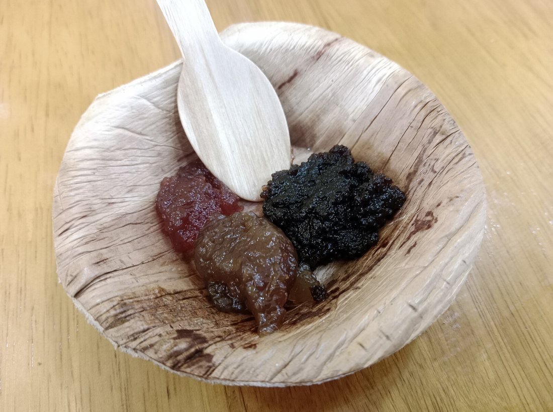 Coconut milk halwa served in a traditional brass vessel, ready to enjoy